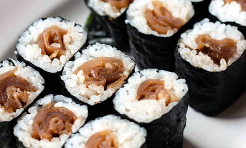 Kanpyo Maki sushi rolls on a board